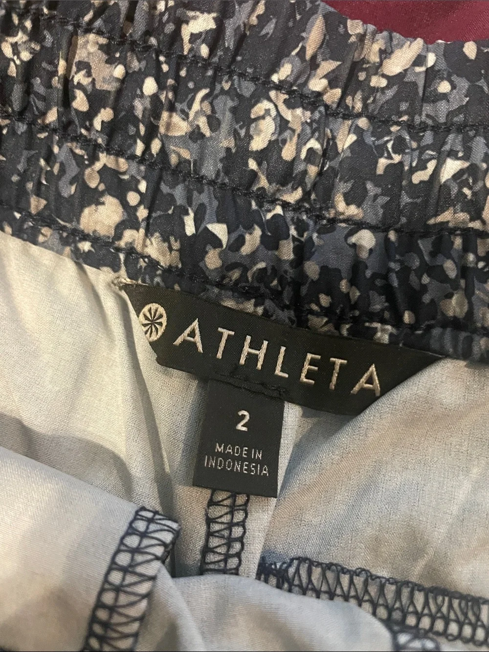 TWO pair 3” inseam Athleta Maroon Floral and Navy Speckle Shorts